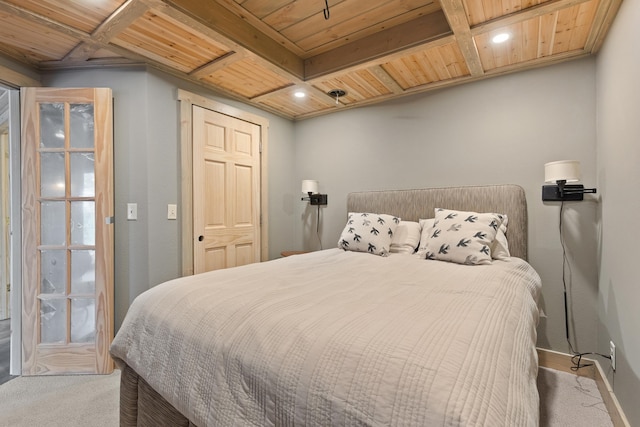 carpeted bedroom with beamed ceiling, baseboards, coffered ceiling, and wood ceiling