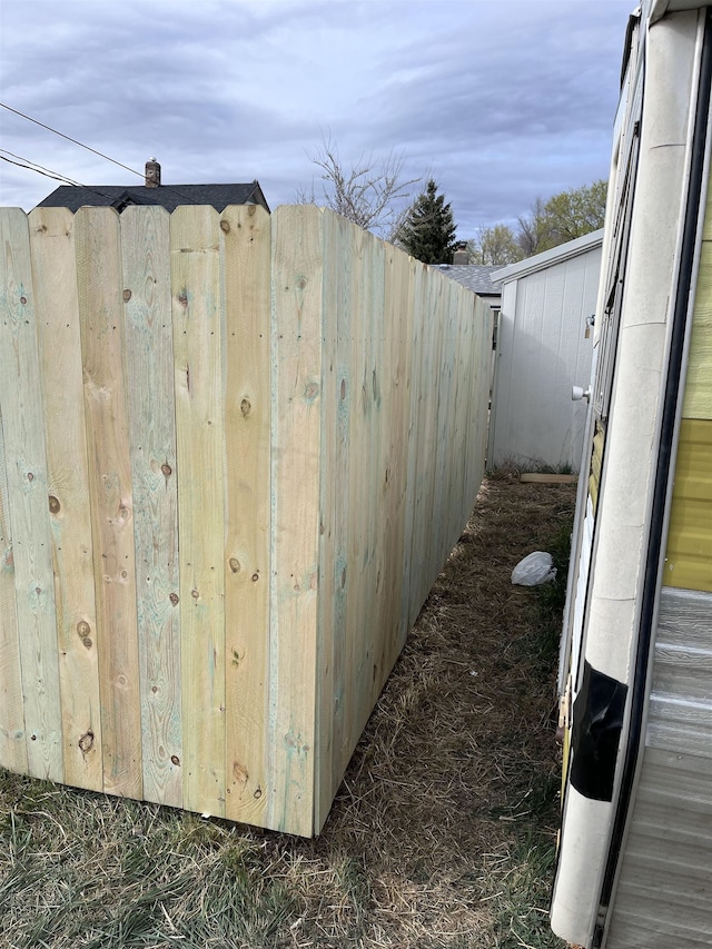 219 St Patrick St, Rapid City, SD 57701 - view of home's exterior featuring fence