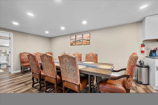 dining area with recessed lighting, baseboards, and light wood-style floors