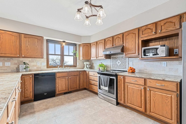 3418 Gray Fox Ct, Rapid City, SD 57701 - kitchen with white microwave, under cabinet range hood, dishwasher, stainless steel electric range, and a sink