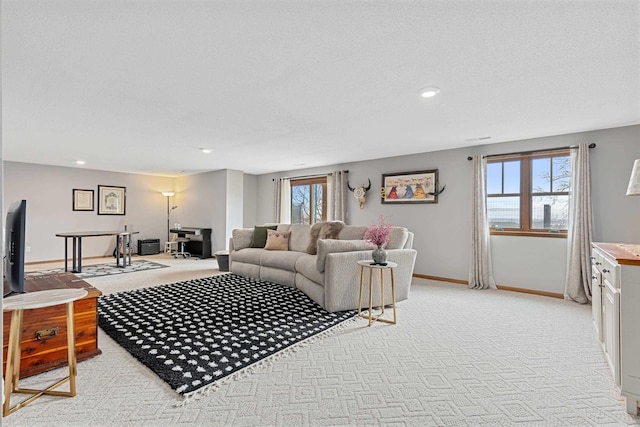 3418 Gray Fox Ct, Rapid City, SD 57701 - living area with a wealth of natural light, recessed lighting, light carpet, and baseboards