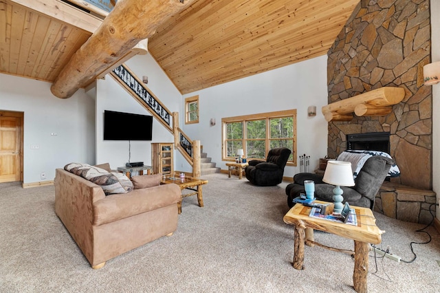 living area featuring stairway, wood ceiling, and carpet floors