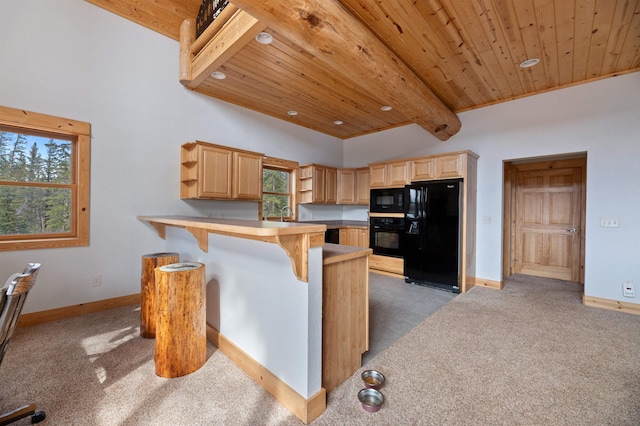 kitchen with light brown cabinetry, beamed ceiling, wooden ceiling, black appliances, and open shelves