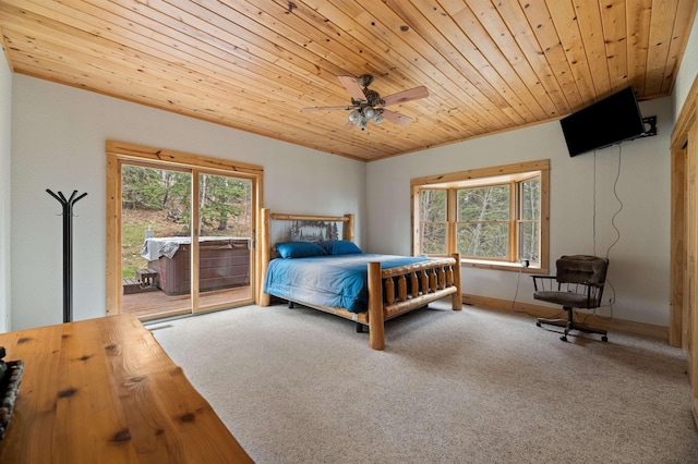 bedroom featuring access to outside, multiple windows, wood ceiling, and carpet floors