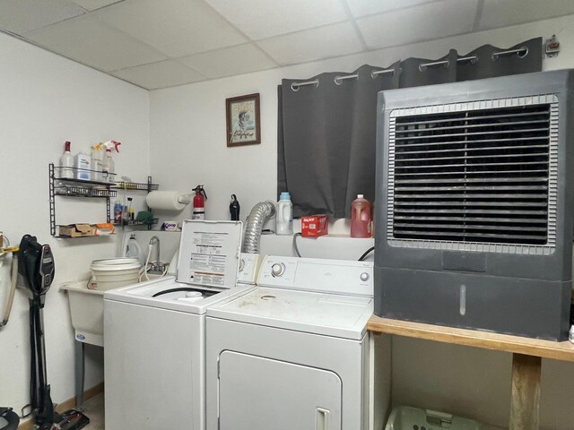 washroom featuring laundry area and separate washer and dryer