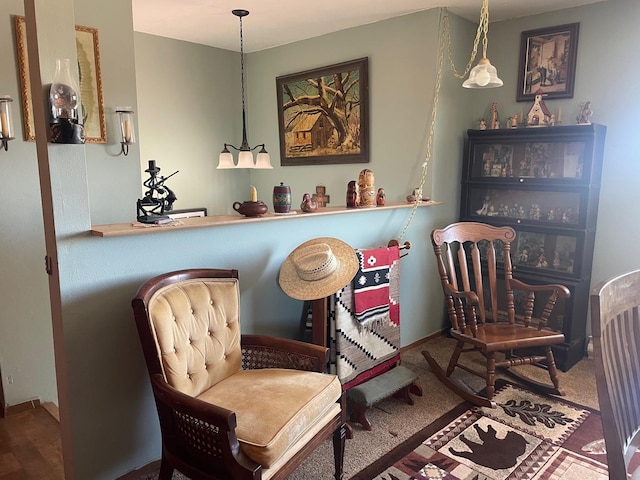 living area featuring carpet floors