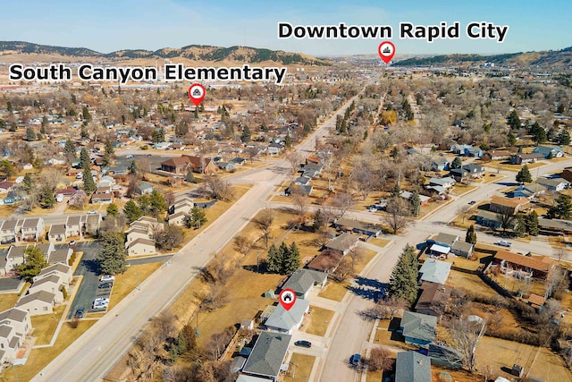 bird's eye view featuring a mountain view and a residential view