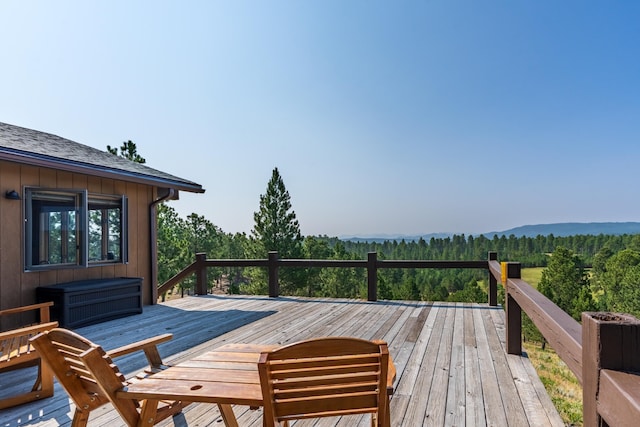 deck with a wooded view