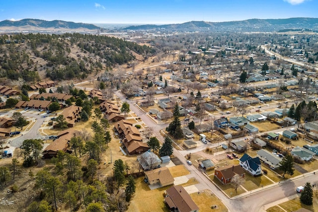 birds eye view of property with a mountain view and a residential view