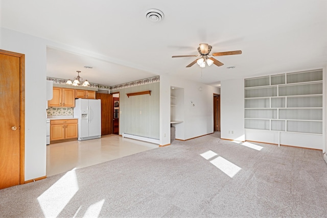 unfurnished living room with a ceiling fan, baseboards, visible vents, light colored carpet, and baseboard heating