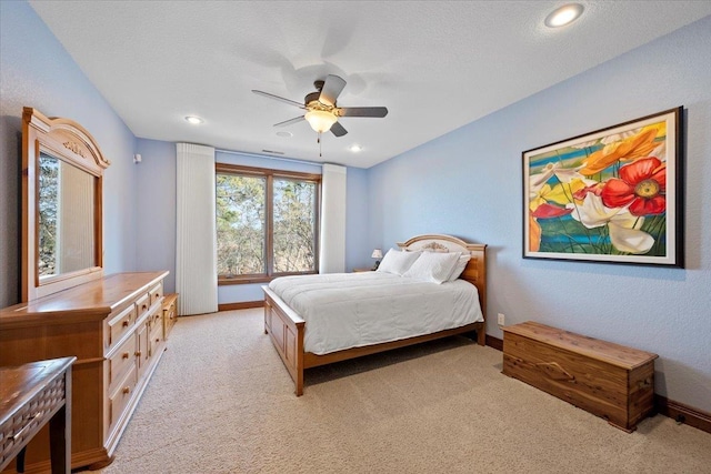 bedroom featuring recessed lighting, baseboards, light carpet, and ceiling fan