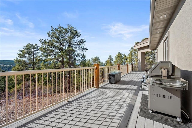 wooden terrace with grilling area