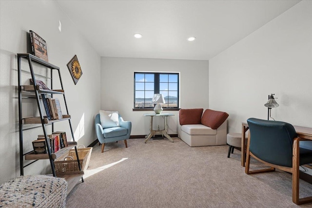 living area with carpet flooring, recessed lighting, and baseboards