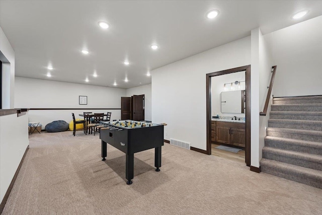 playroom featuring recessed lighting, light colored carpet, visible vents, and baseboards