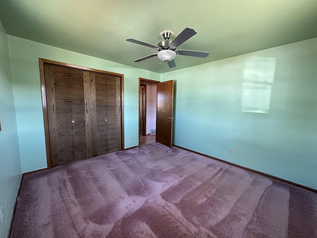 unfurnished bedroom featuring a closet, carpet floors, baseboards, and ceiling fan