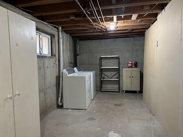 basement featuring washing machine and dryer