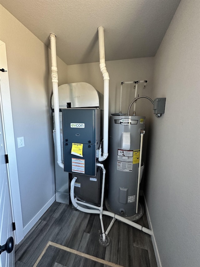 utility room with electric water heater