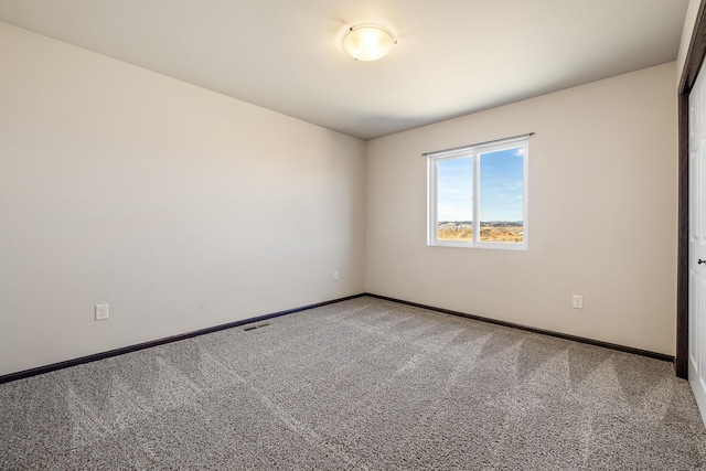 427 Diamond Ridge Blvd, Rapid City, SD 57703 - carpeted spare room with visible vents and baseboards