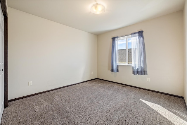427 Diamond Ridge Blvd, Rapid City, SD 57703 - unfurnished room featuring carpet flooring and baseboards