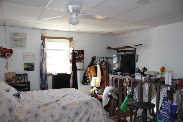 bedroom with a paneled ceiling
