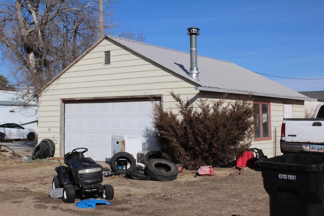exterior space with metal roof