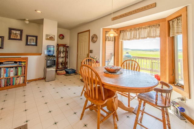 13220 N Haines Ave, Rapid City, SD 57701 - dining area featuring baseboards, recessed lighting, and light floors