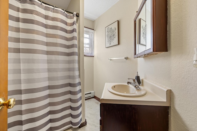 full bathroom with vanity, a textured wall, a textured ceiling, a baseboard radiator, and curtained shower