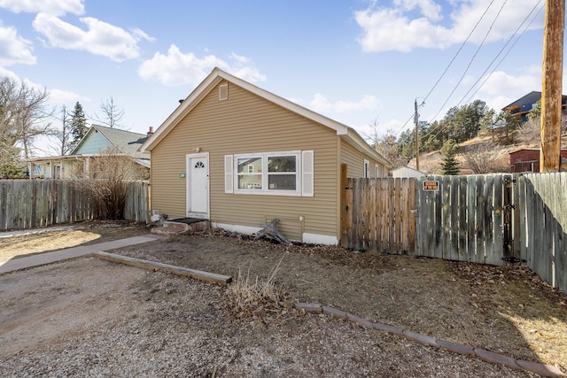 view of front of home featuring fence and entry steps