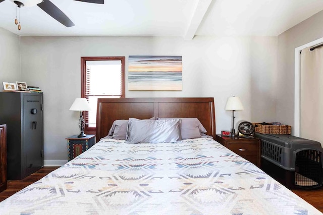 41 Taylor Ave, Deadwood, SD 57732 - bedroom with baseboards, dark wood-style floors, ceiling fan, and beamed ceiling