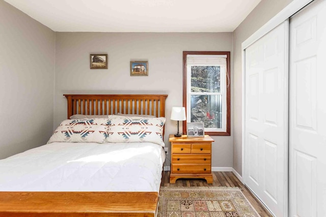 41 Taylor Ave, Deadwood, SD 57732 - bedroom with baseboards, a closet, and wood finished floors