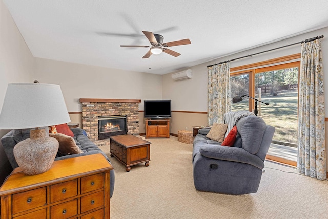 living area with a wall unit AC, a textured ceiling, a ceiling fan, light carpet, and a fireplace