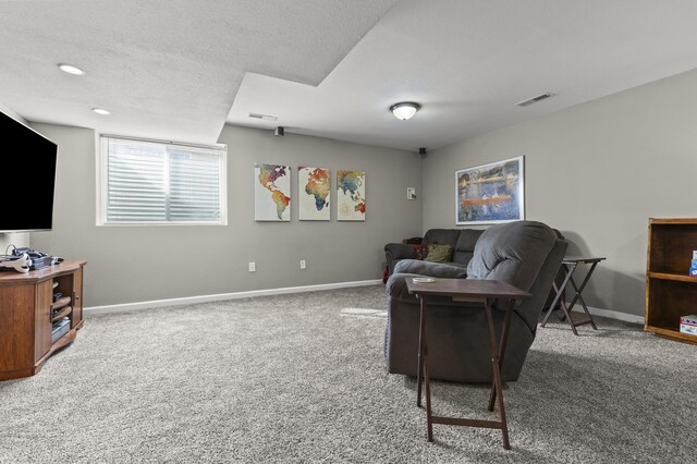 3370 Remington Rd, Rapid City, SD 57703 - carpeted living room featuring baseboards, visible vents, and a textured ceiling