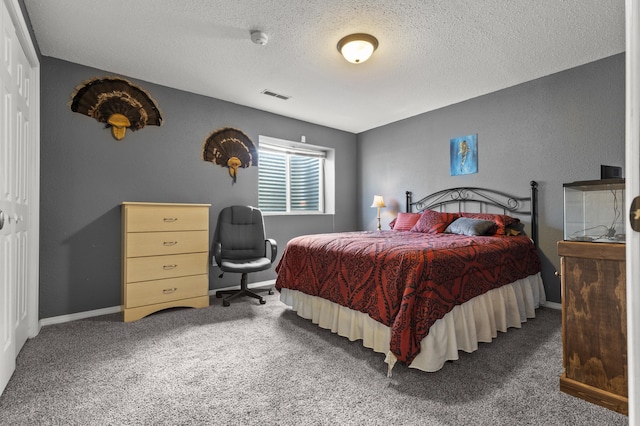 3370 Remington Rd, Rapid City, SD 57703 - bedroom with a closet, a textured ceiling, visible vents, carpet, and baseboards