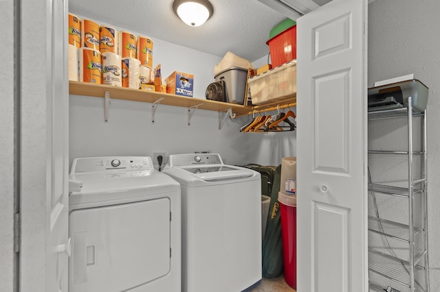 3370 Remington Rd, Rapid City, SD 57703 - laundry room featuring separate washer and dryer, laundry area, and a textured ceiling