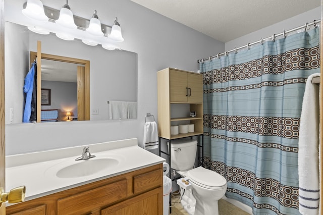 3370 Remington Rd, Rapid City, SD 57703 - bathroom with a shower with curtain, toilet, vanity, and a textured ceiling