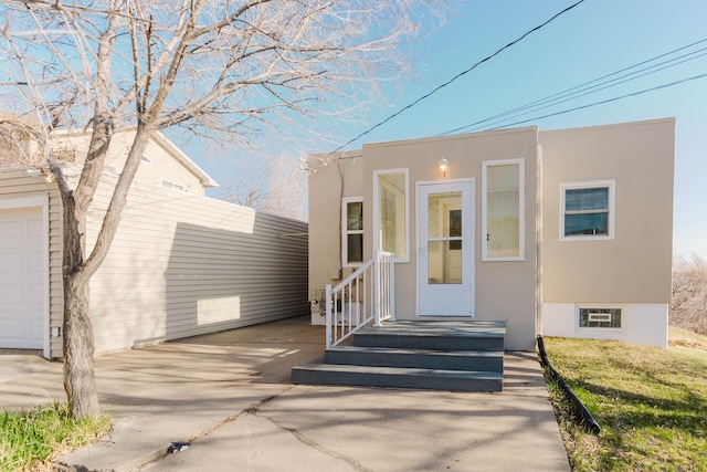 1227 S Street, Rapid City, SD 57701 - view of front facade featuring stucco siding