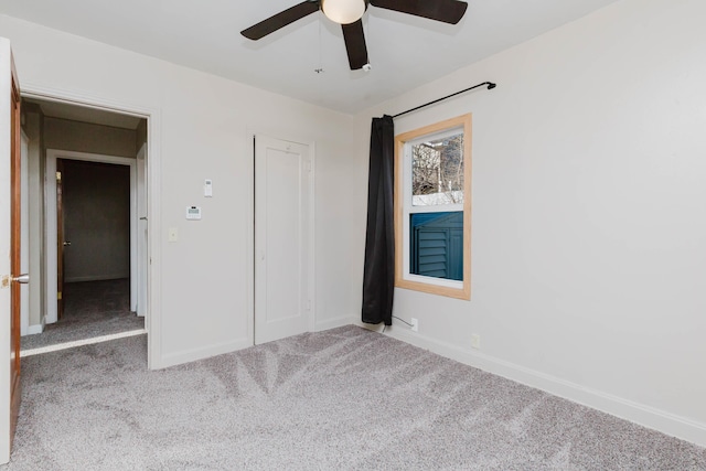 1227 S Street, Rapid City, SD 57701 - unfurnished bedroom featuring ceiling fan, baseboards, and carpet floors