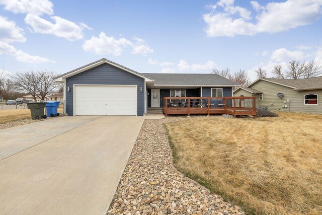 1914 7th Ave, Belle Fourche, SD 57717 - ranch-style house featuring fence, a garage, and driveway
