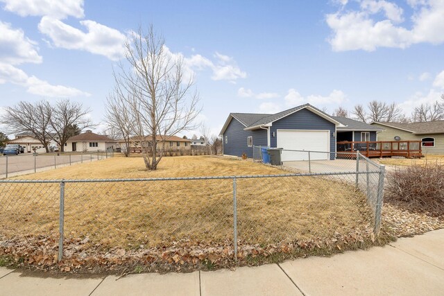 1914 7th Ave, Belle Fourche, SD 57717 - ranch-style house with an attached garage, fence, and concrete driveway