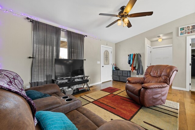 1914 7th Ave, Belle Fourche, SD 57717 - living area with wood finished floors, baseboards, a ceiling fan, and lofted ceiling