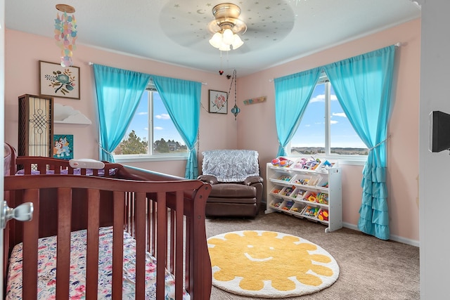 carpeted bedroom with baseboards