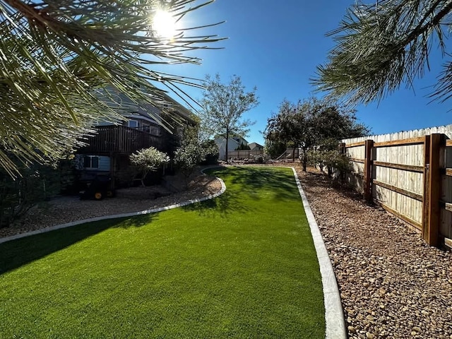 view of yard featuring fence
