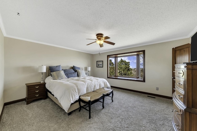 bedroom featuring ornamental molding, baseboards, light carpet, and a textured ceiling