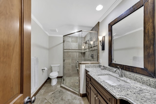 bathroom with a shower stall, vanity, ornamental molding, and toilet