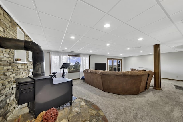 carpeted living area featuring visible vents, recessed lighting, and a drop ceiling
