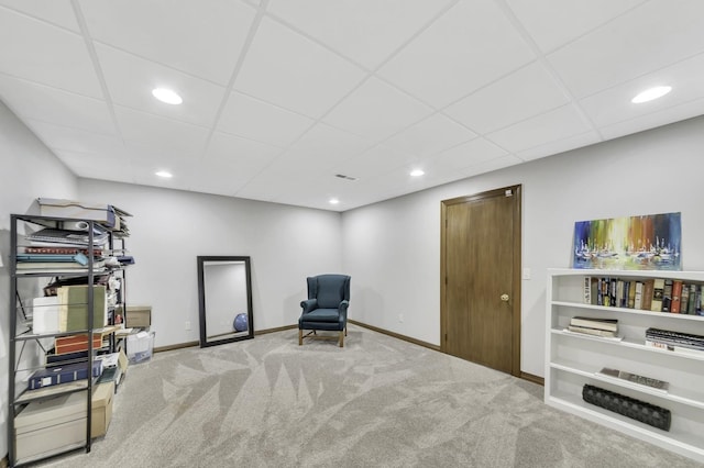 sitting room featuring recessed lighting, carpet flooring, a paneled ceiling, and baseboards