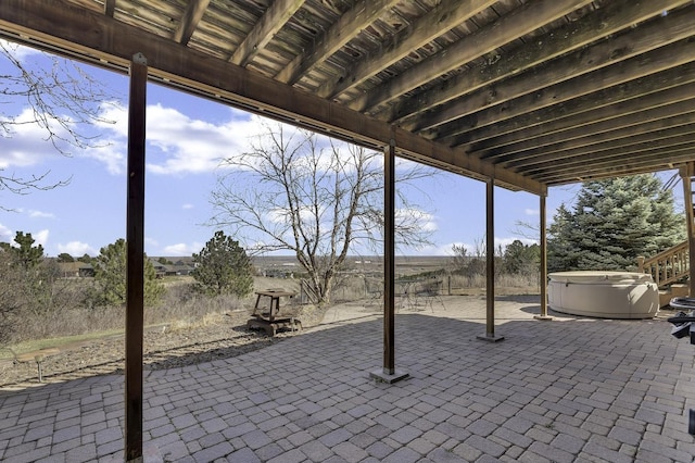 view of patio featuring a hot tub