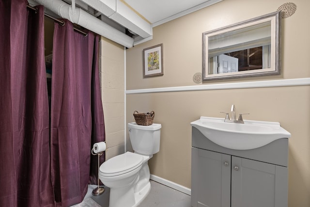 4101 Pleasant Dr, Rapid City, SD 57702 - bathroom with a shower with shower curtain, vanity, baseboards, toilet, and concrete flooring