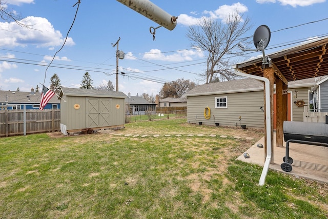 4101 Pleasant Dr, Rapid City, SD 57702 - view of yard with a storage shed, a fenced backyard, and an outdoor structure