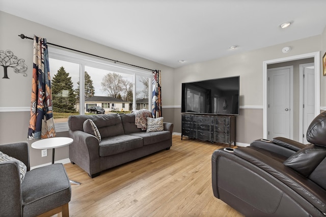 4101 Pleasant Dr, Rapid City, SD 57702 - living room featuring baseboards and light wood-style floors